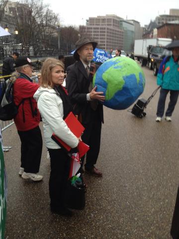 Dr. James Hansen holding "the whole world" at the White House Pray-in