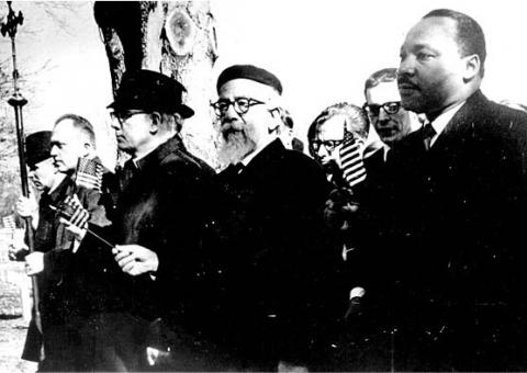 At Arlington National Cemetery in 1967, Dr. King, Rabbi Heschel, and others in Clergy and Laity Concerned About Vietnam prayed together for the US government to end its war against Vietnam.