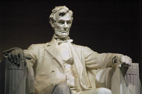 Sorrowful Lincoln at the Memorial